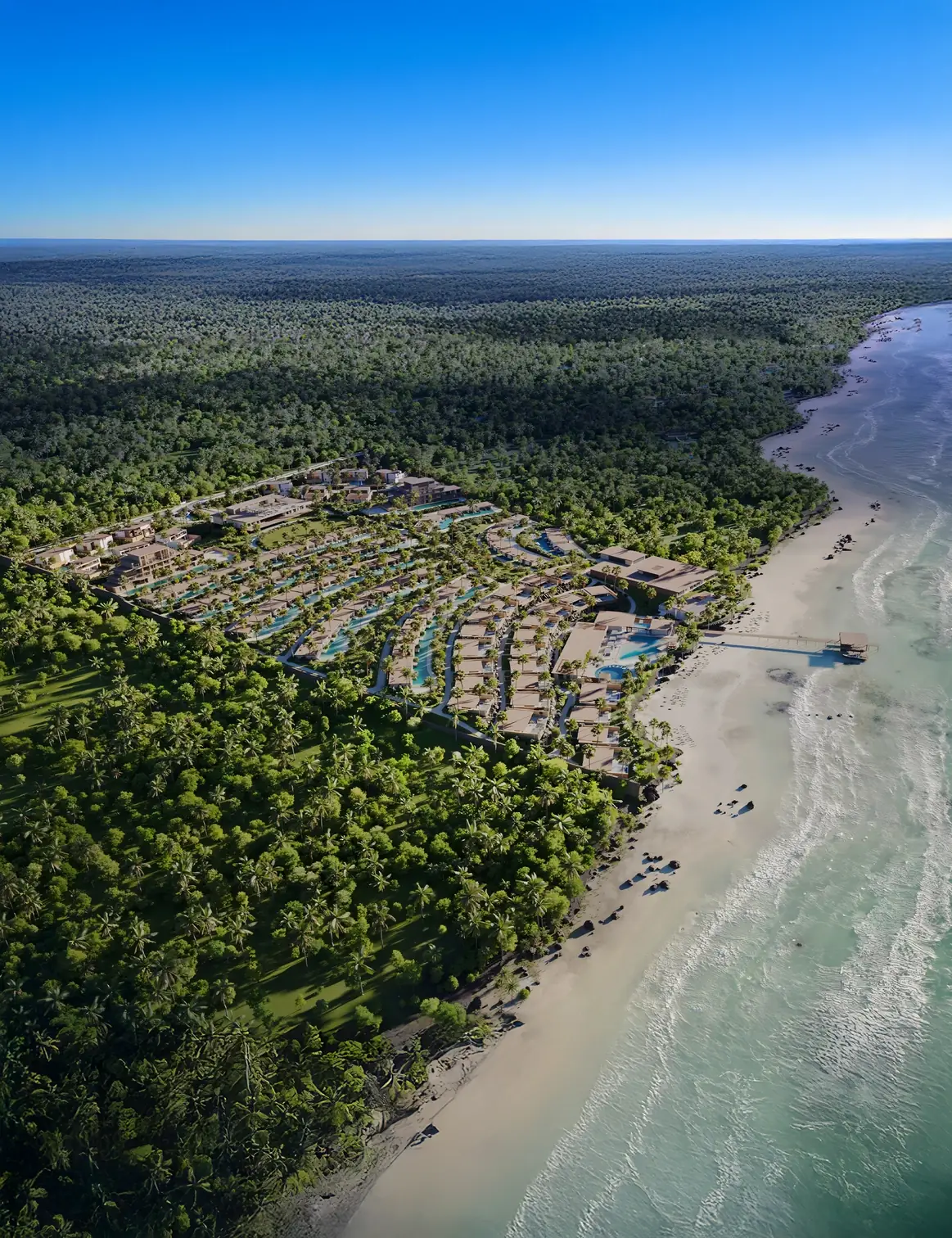 Aerial view of Anantara Zanzibar Resort & Residences between tropical forest and the Indian Ocean in Nungwi
